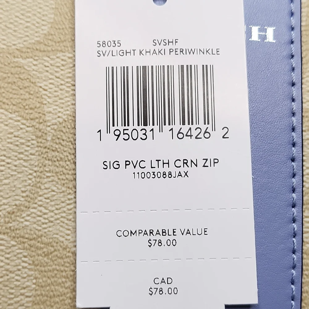 New with tags- Coach Periwinkle Wristlet - Picture 6 of 6